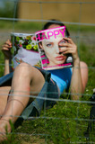 Castle Combe Superbikes Spectator Lady With Magazine A8V0178